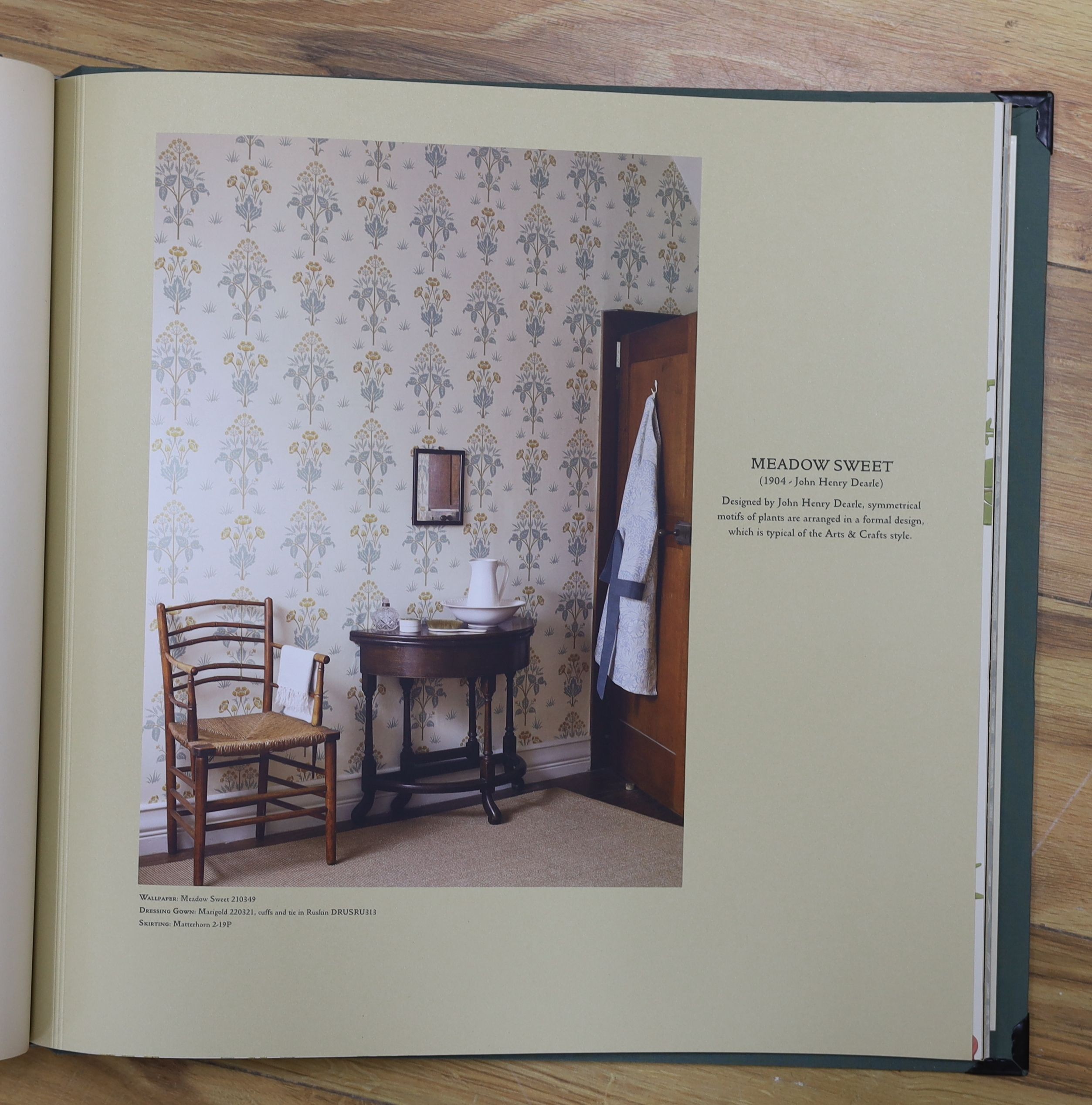 A contemporary William Morris & Co. archive wallpaper pattern book celebrating 150 years of Morris and Co. Design, together with G.P. & J Baker linen pattern book (2)